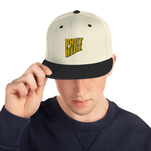 classic-snapback-natural-black-front-64133d86c67bd.jpg