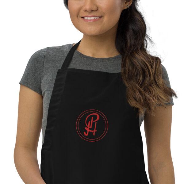 embroidered-apron-black-zoomed-in-6409630de0e7d.jpg
