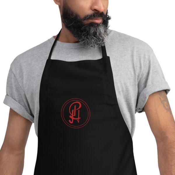 embroidered-apron-black-zoomed-in-6409630e2528b.jpg