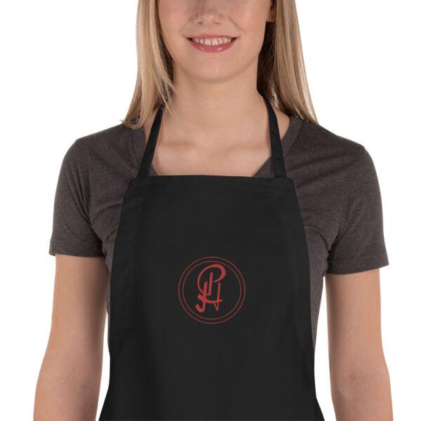 embroidered-apron-black-zoomed-in-6409630e253cd.jpg