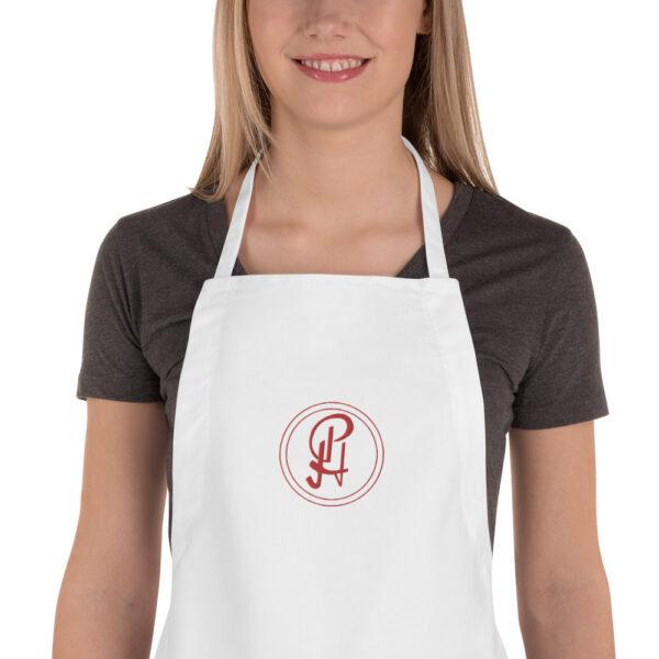 embroidered-apron-white-zoomed-in-6409630e256fa.jpg